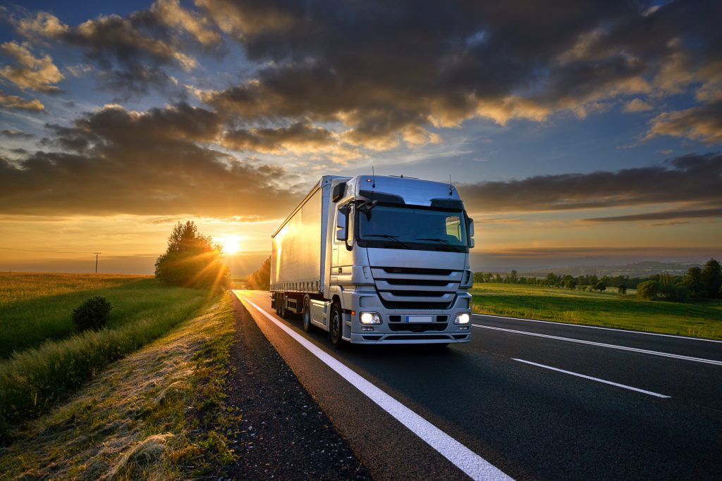 truck driving on road