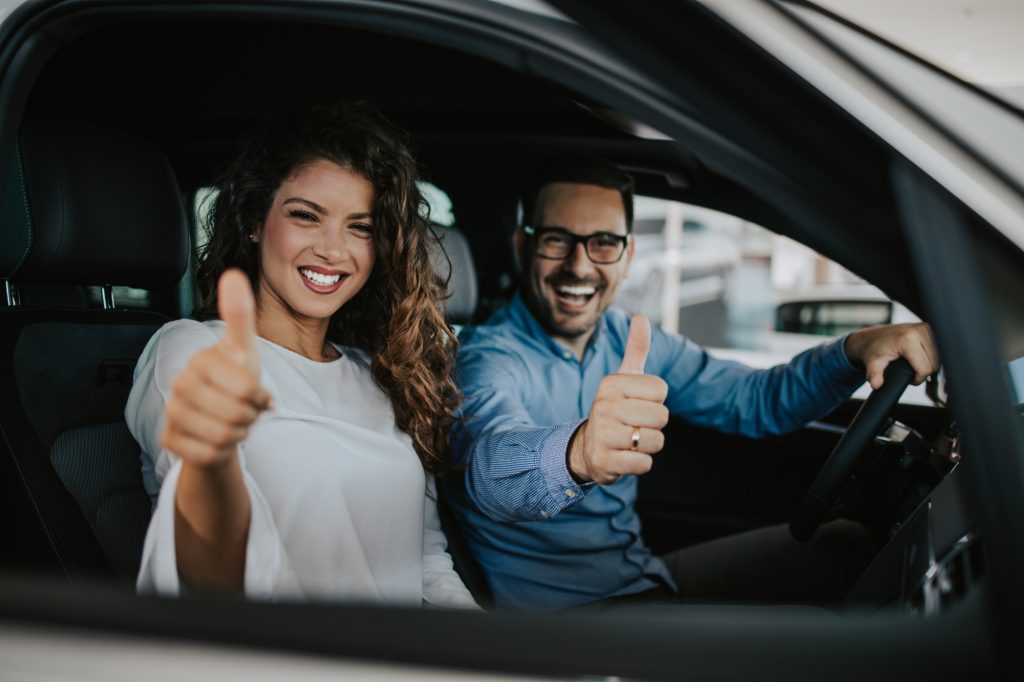 couple buying a car