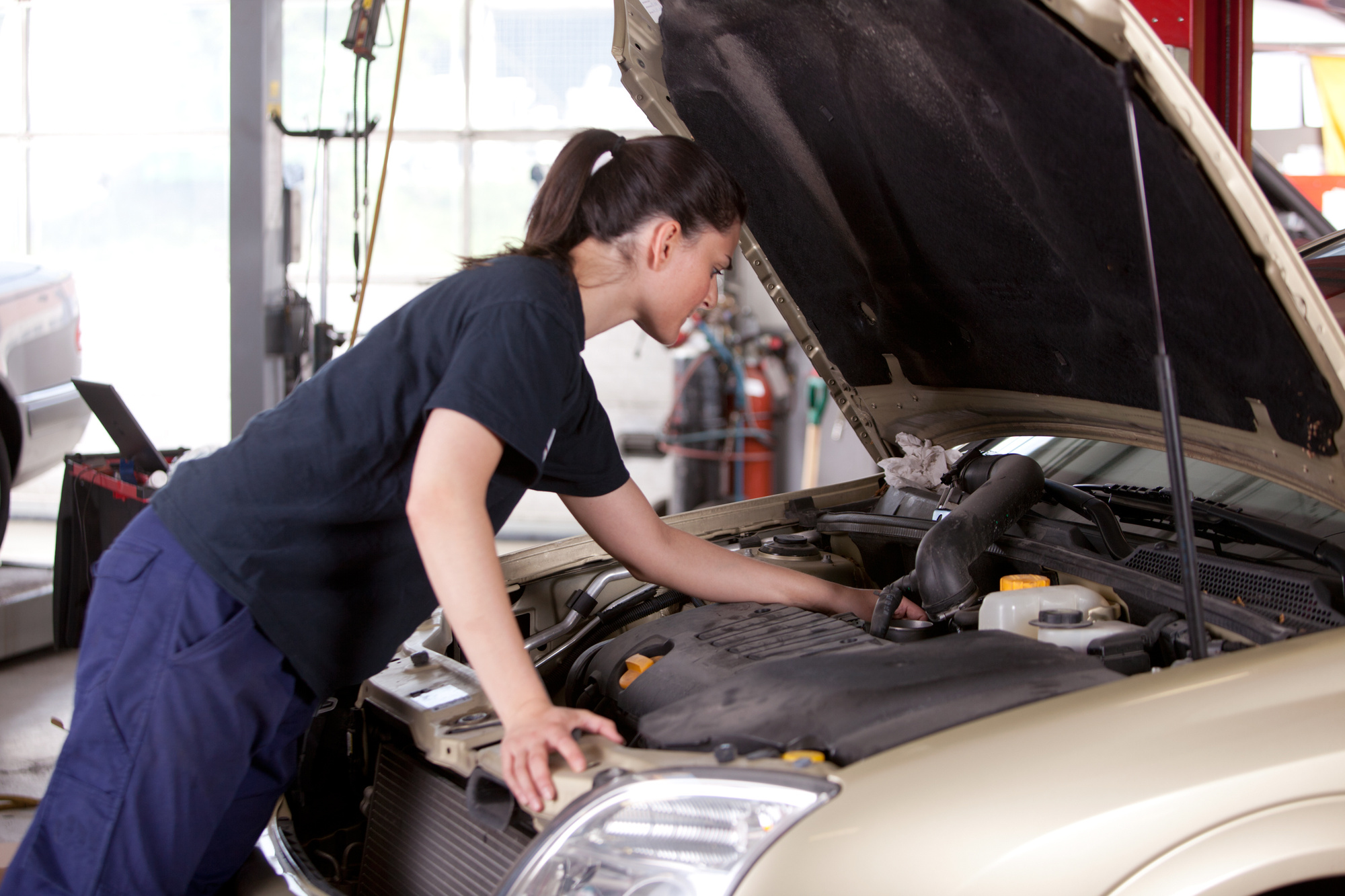 mechanic working on car